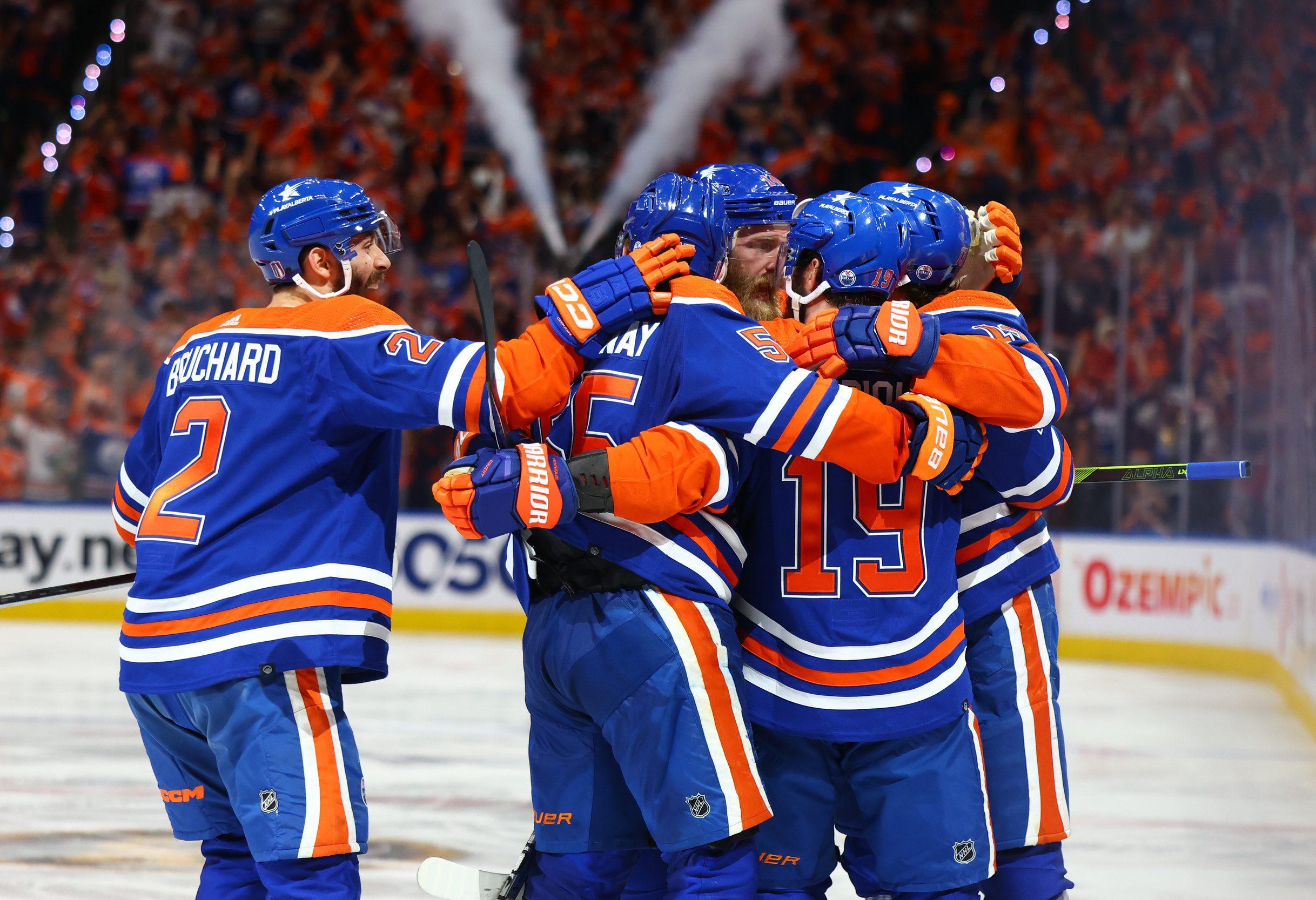 Edmonton Oilers celebrate center Adam Henrique's goal.