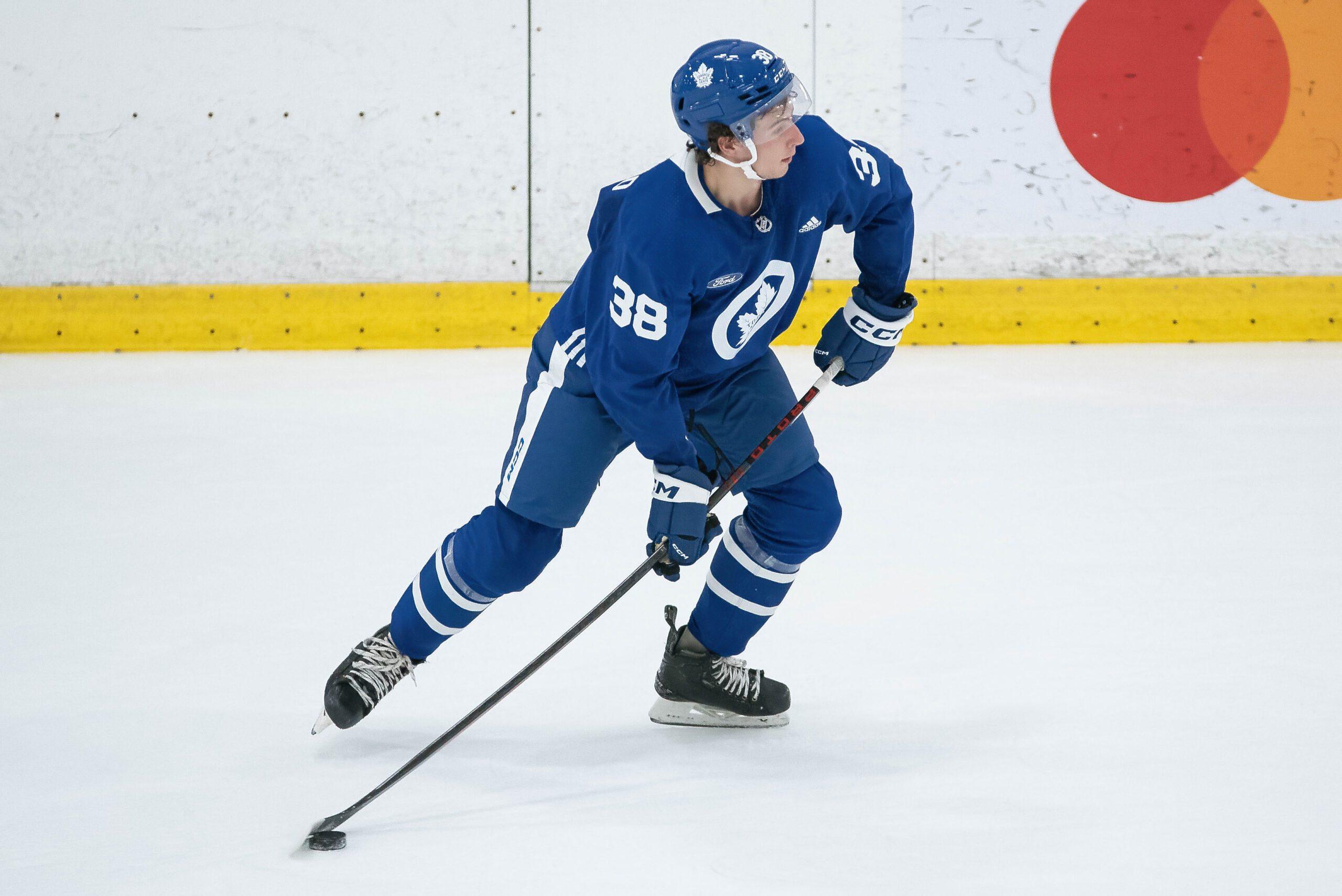 Maple Leafs’ Ben Danford leaves practice after awkward hit