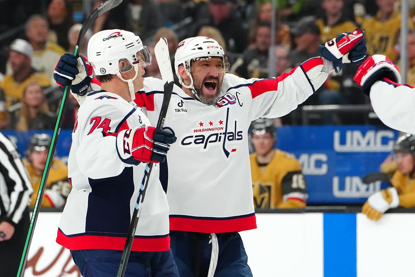 Washington Capitals left wing Alex Ovechkin (8) celebrates with Washington Capitals defenseman John Carlson (74) after scoring a goal against the Vegas Golden Knights during the first period at T-Mobile Arena