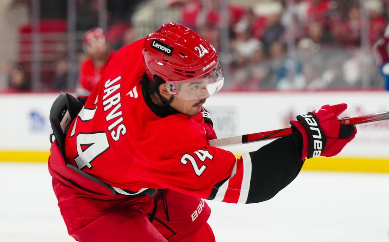 Carolina Hurricanes center Seth Jarvis (24) takes a shot against the Colorado Avalanche during the first period at Lenovo Center.