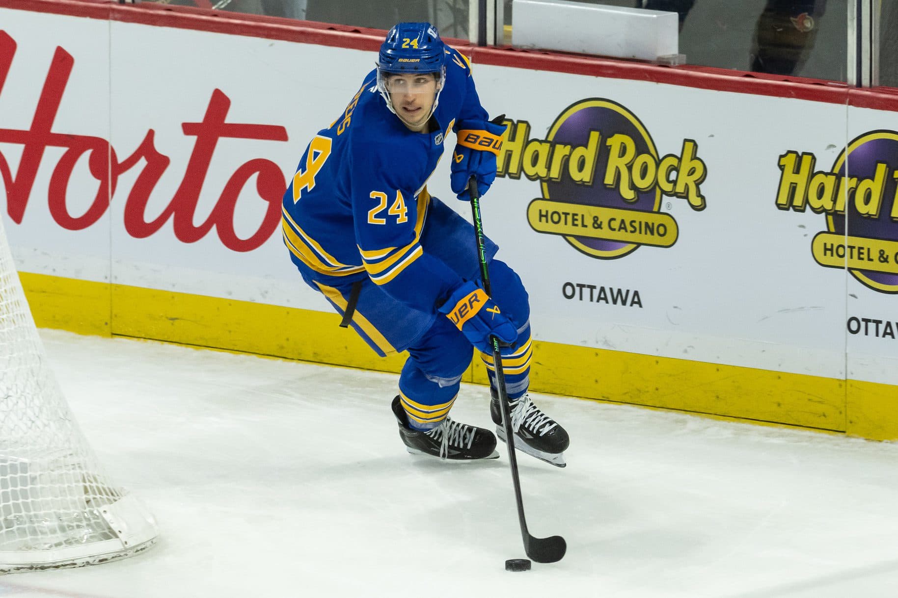 Buffalo Sabres center Dylan Cozens (24) skates with the puck in the third period against the Ottawa Senators at the Canadian Tire Centre.