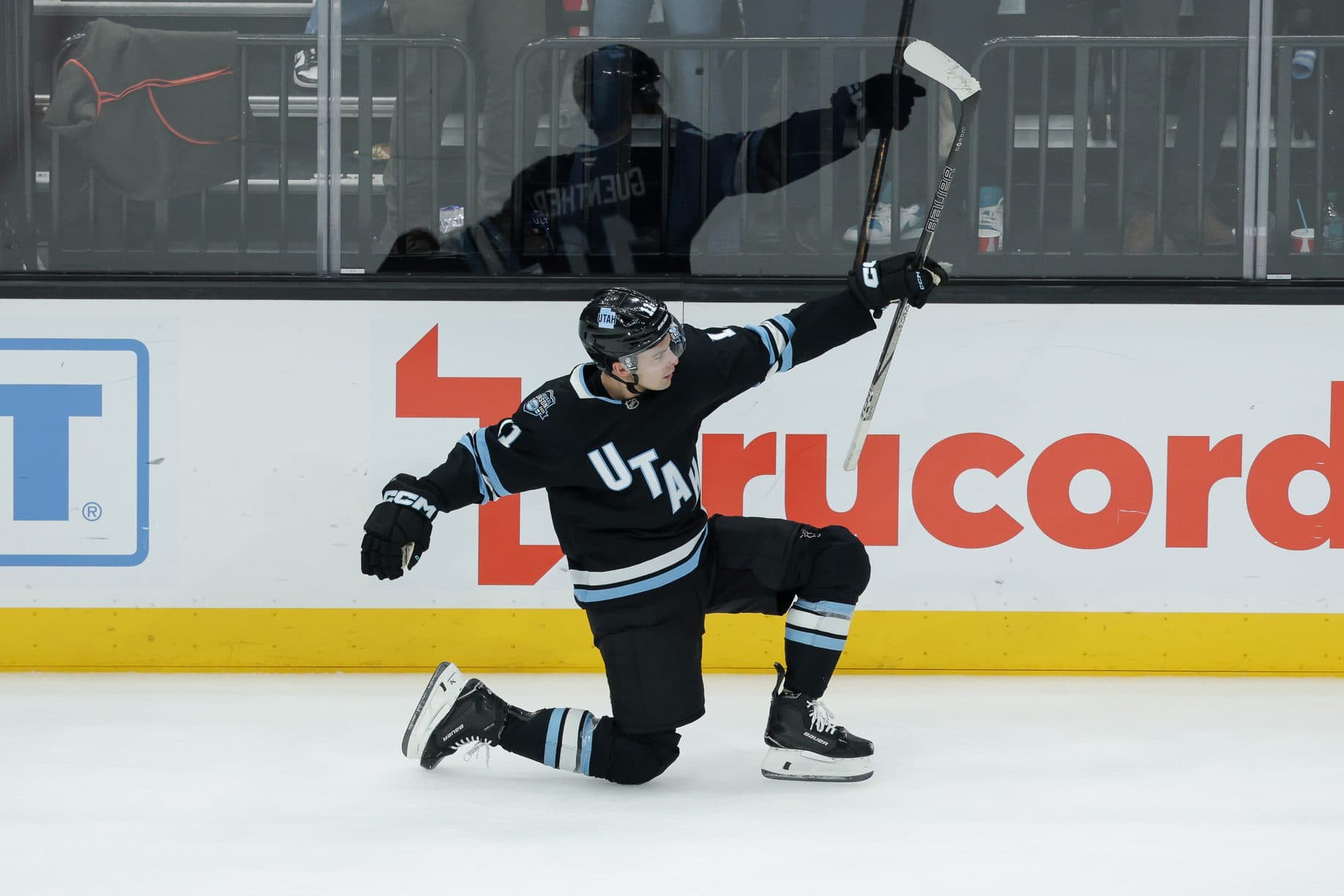 Utah Hockey Club right wing Dylan Guenther (11) celebrates scoring the game winning goal in overtime against the Philadelphia Flyers at Delta Center.