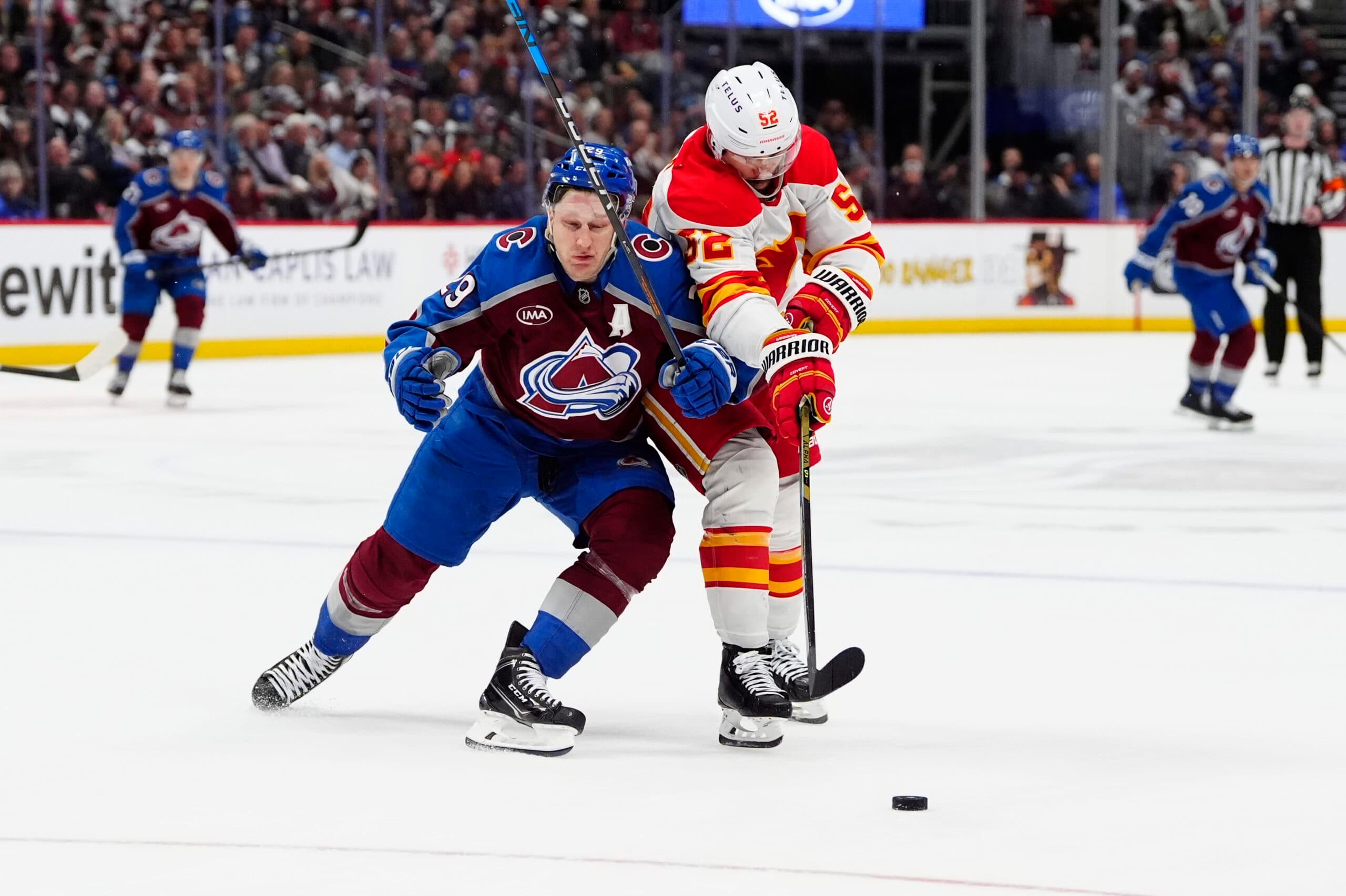 Nathan MacKinnon and MacKenzie Weegar
